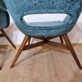 Restored shell armchairs by Miroslav Navratil
