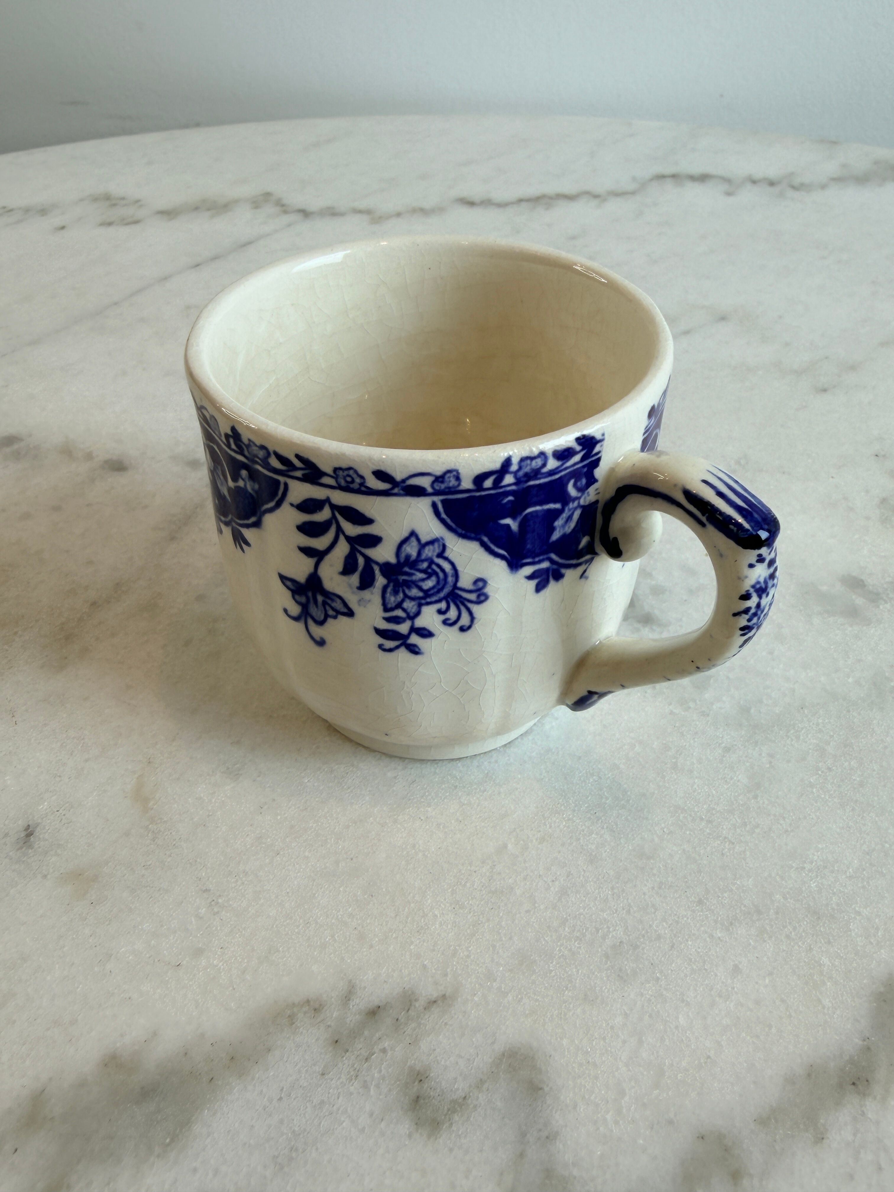 A cup made of ironstone - Gien