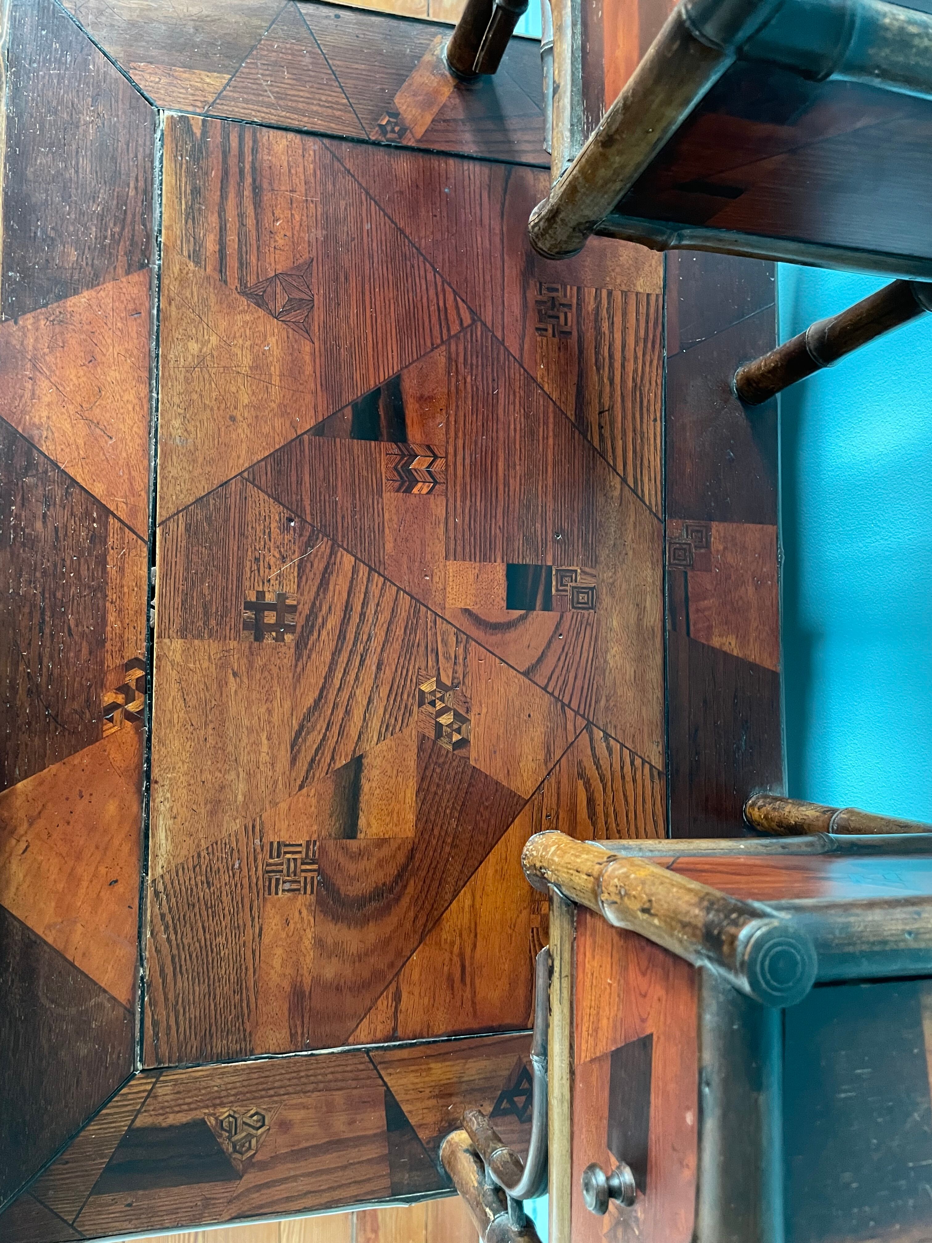 Old secretary in marquetry and bamboo