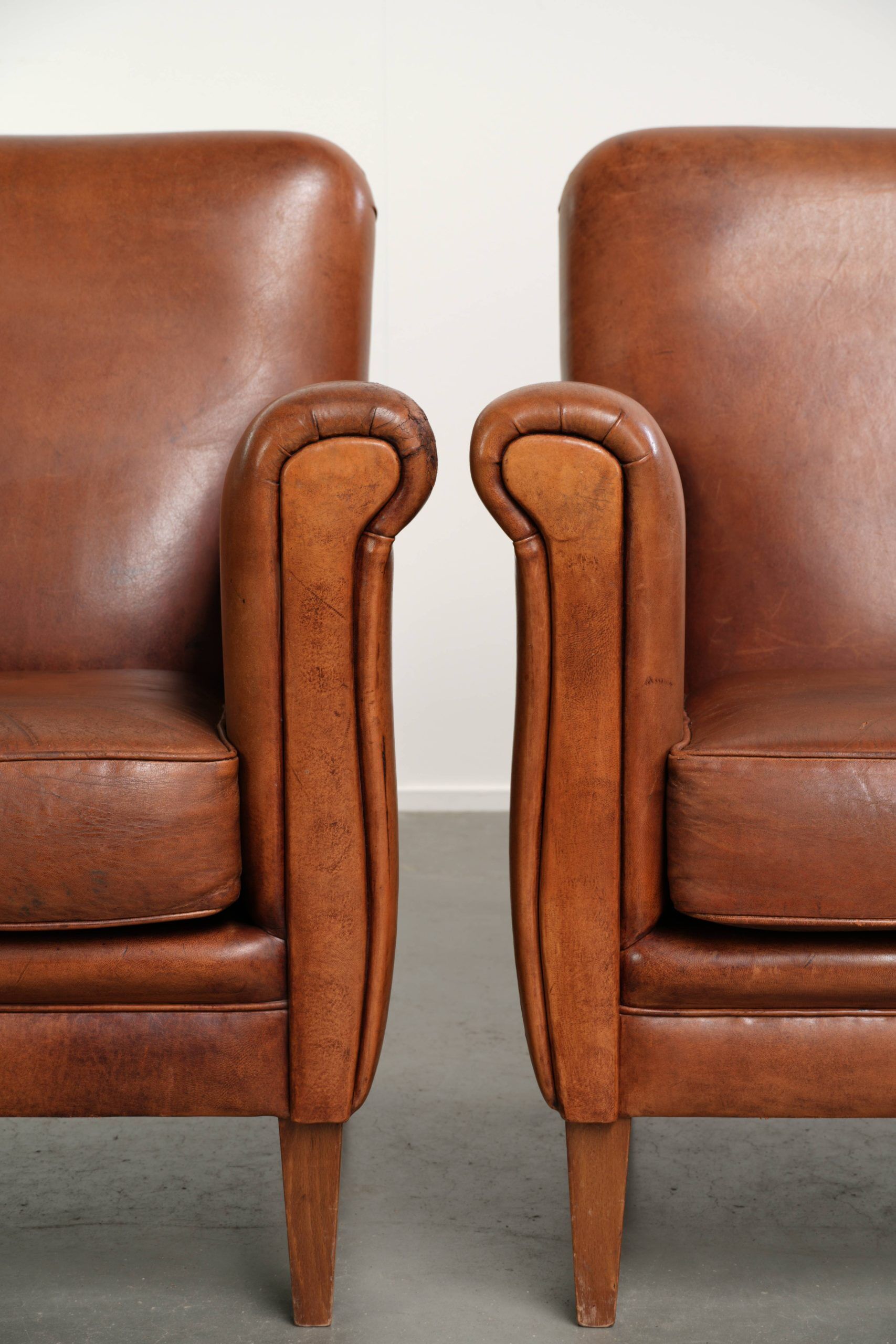 Comfortable set of sheepskin armchairs with and a timeless design