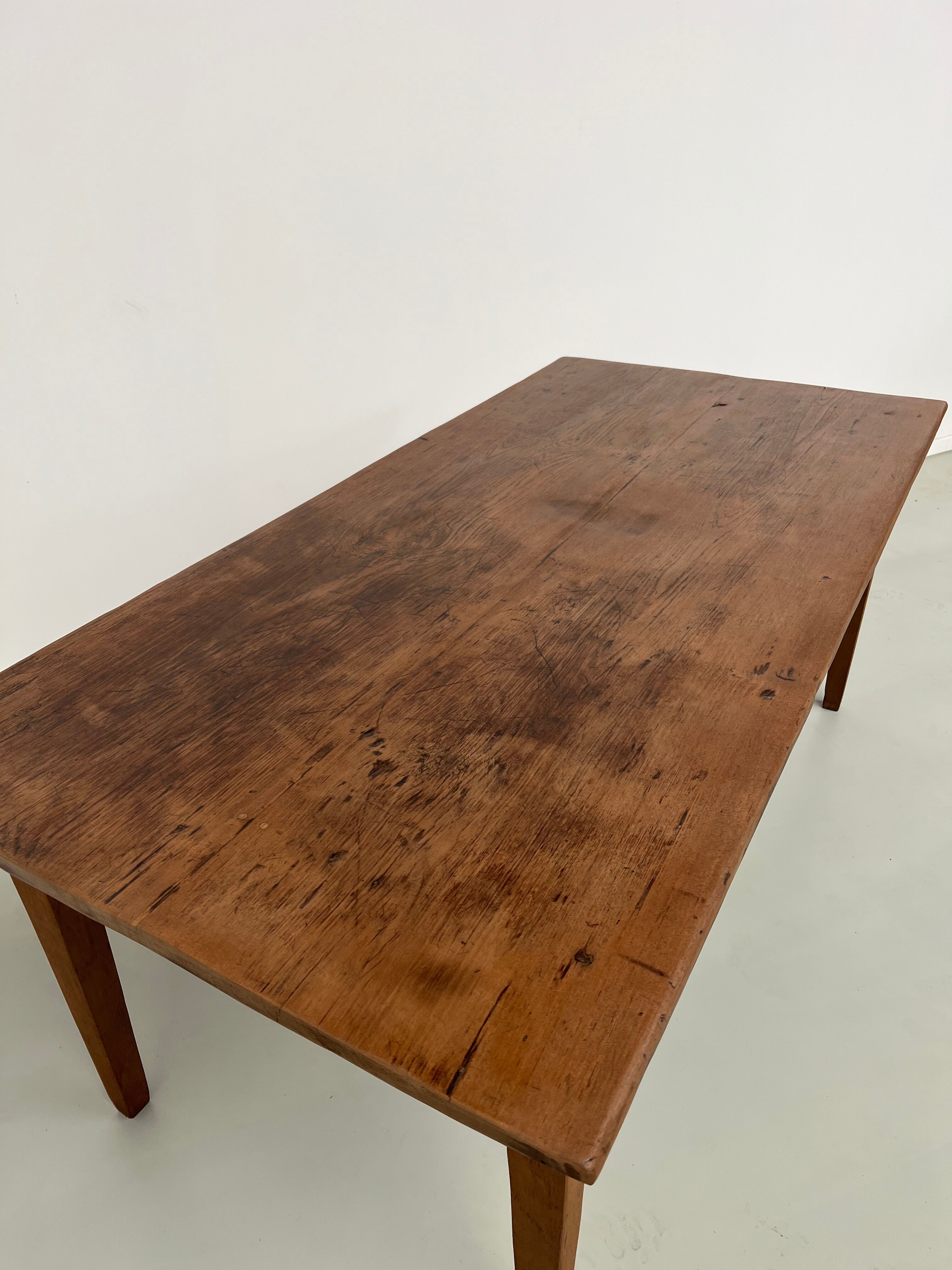Teak dining table with spindle legs, 50s