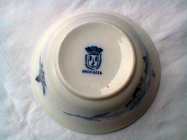 Ramekin in earthenware with decoration of flowers, butterflies and birds