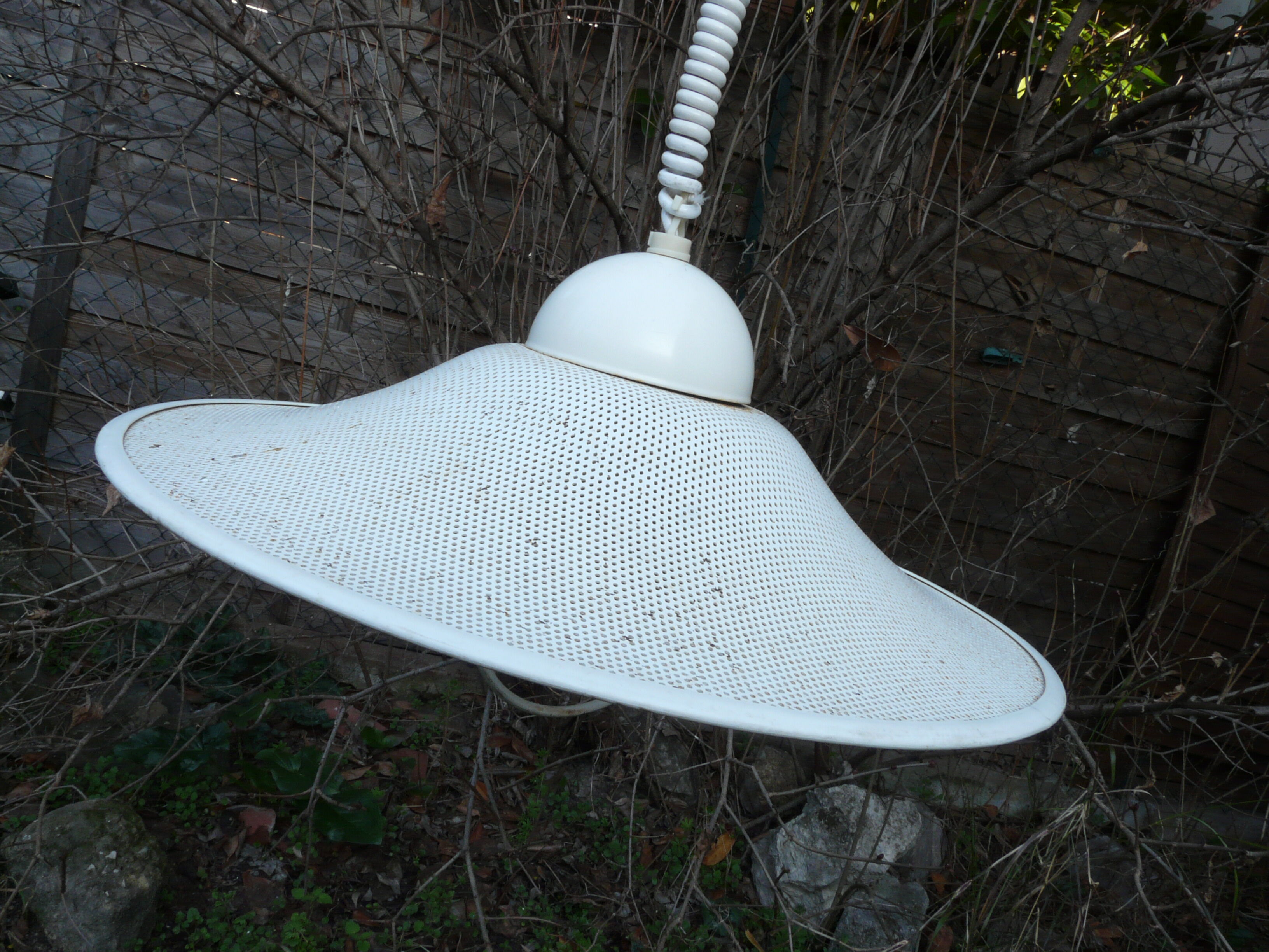 White perforated sheet metal chandelier