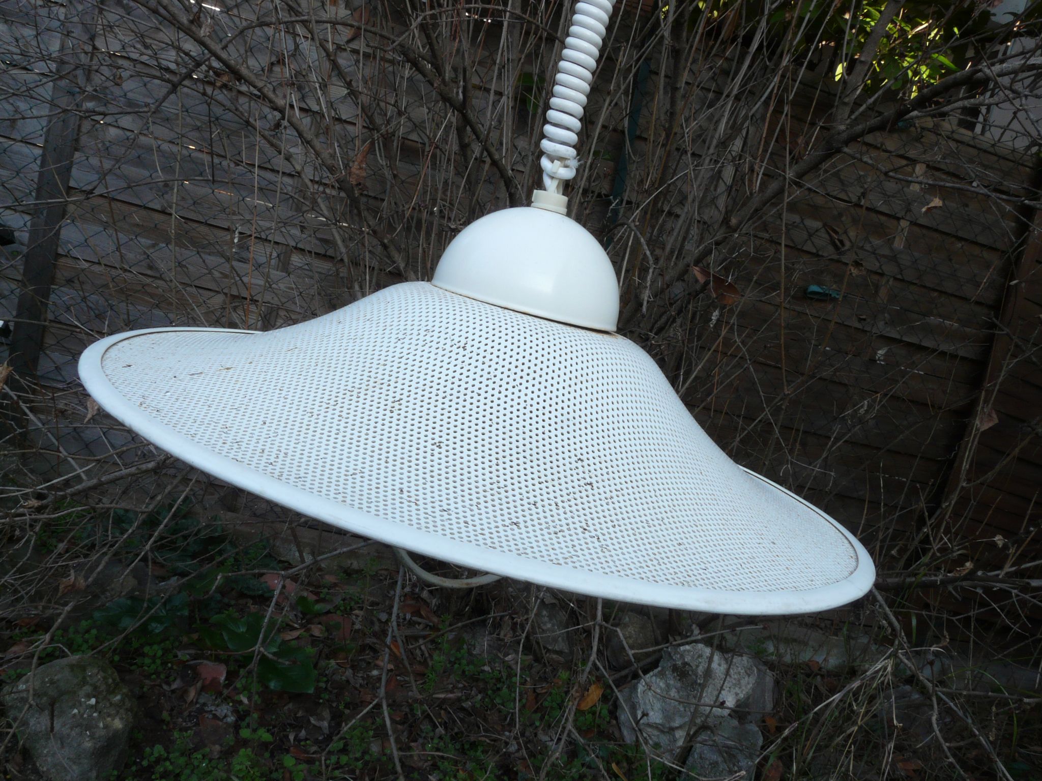White perforated sheet metal chandelier