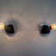 Pair of mid-century bedside lamps in brass and black metal, 1960, Italy