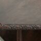 Antique wooden English rotating book table/side table from the 19th century