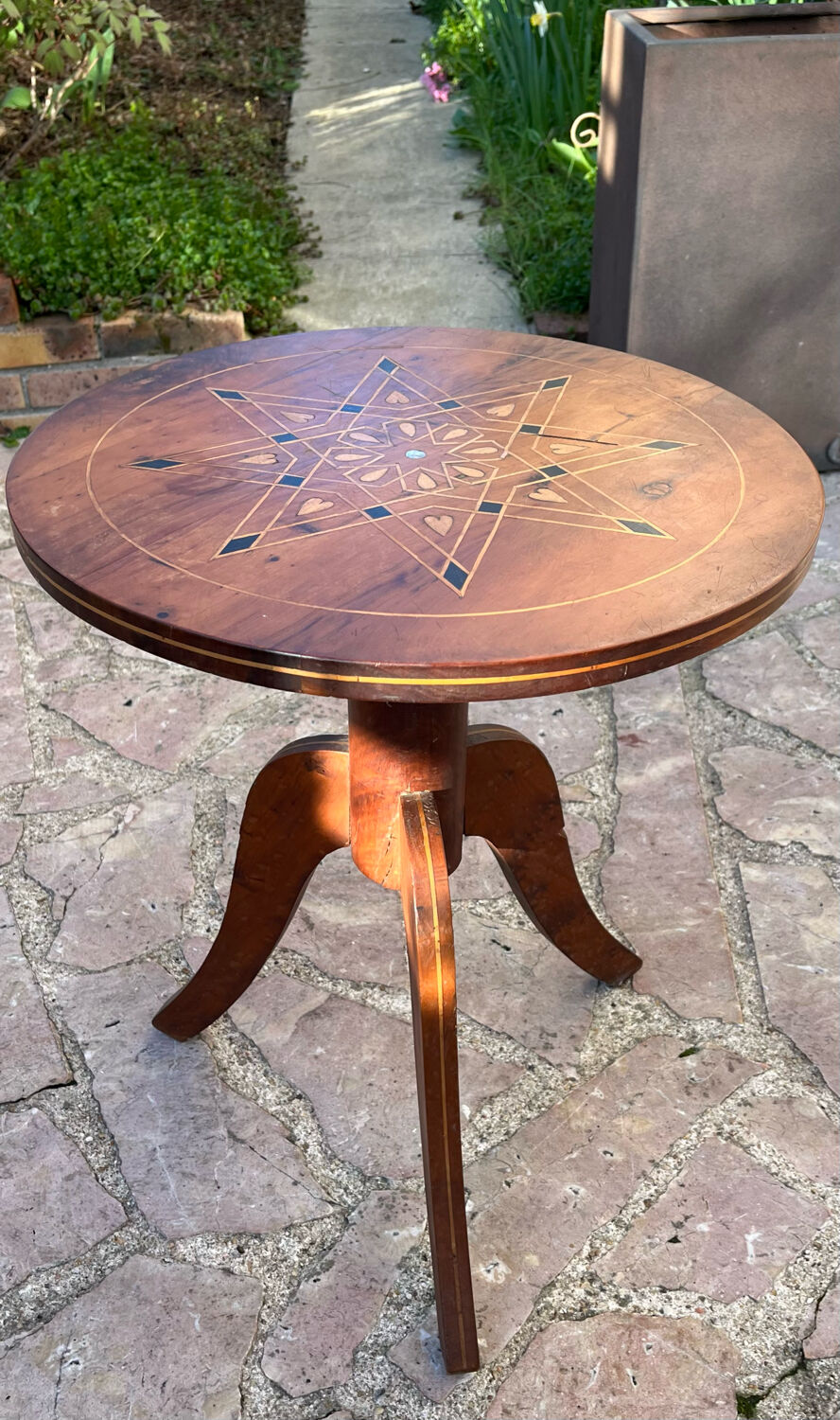 Old inlaid pedestal table