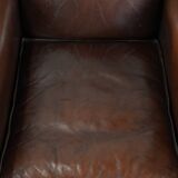 Armchair made of sheepskin leather in art deco design with warm colours
