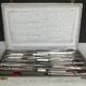 12 silver metal knives