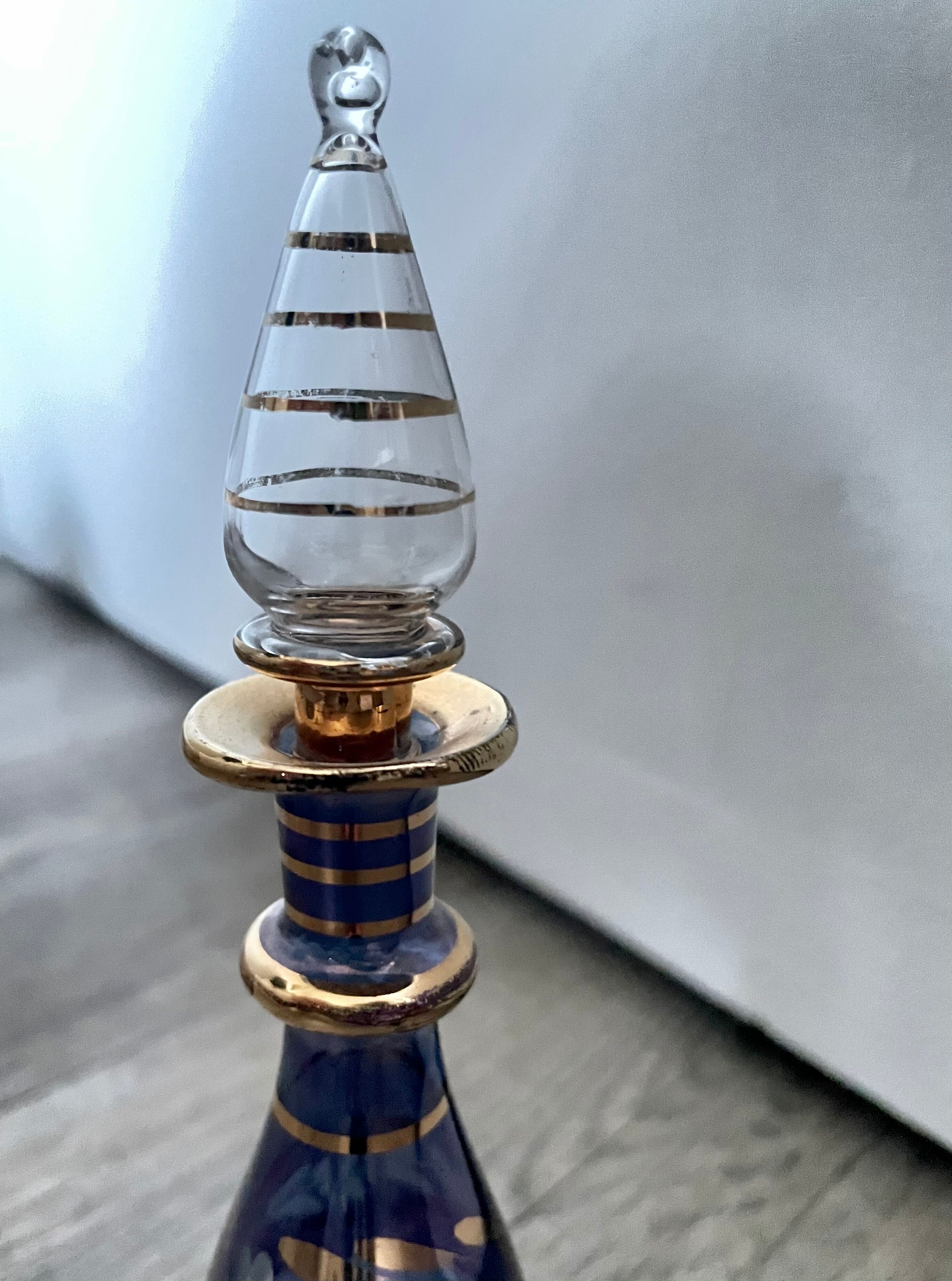 Purple glass perfume bottle