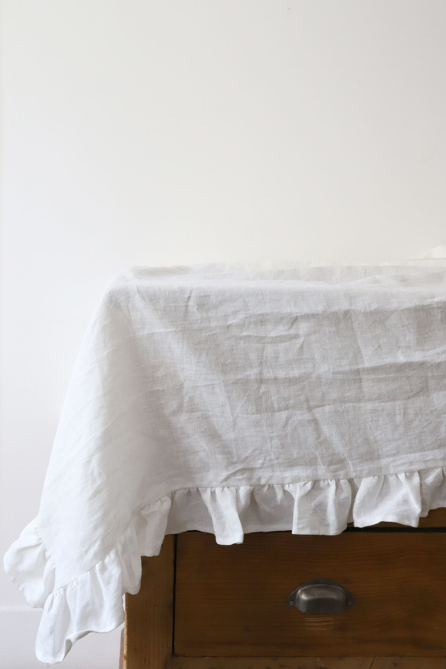 Flying tablecloth in white upcycled linen