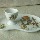 Porcelain egg cup on frame Limoges Poulbot de Paris