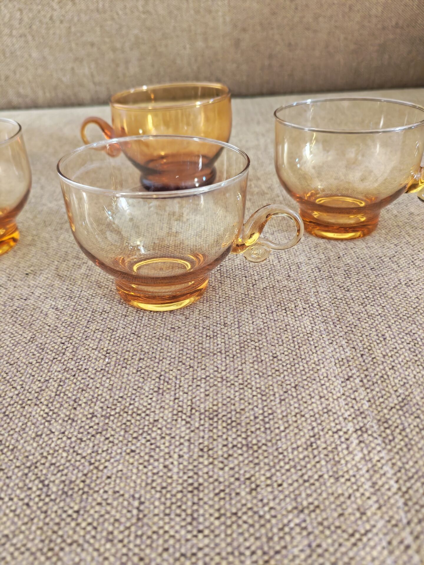 Set of four vintage amber glass cups