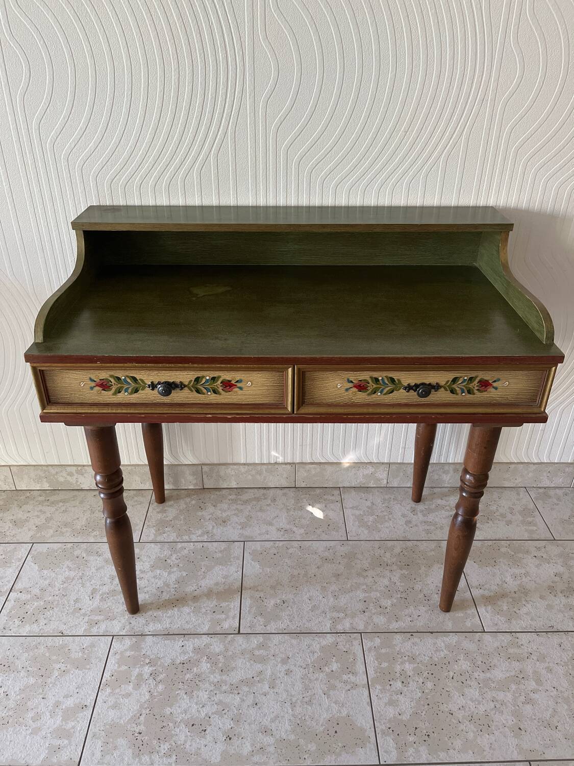 Wooden dressing table with olive green chair and floral patterns