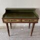 Wooden dressing table with olive green chair and floral patterns