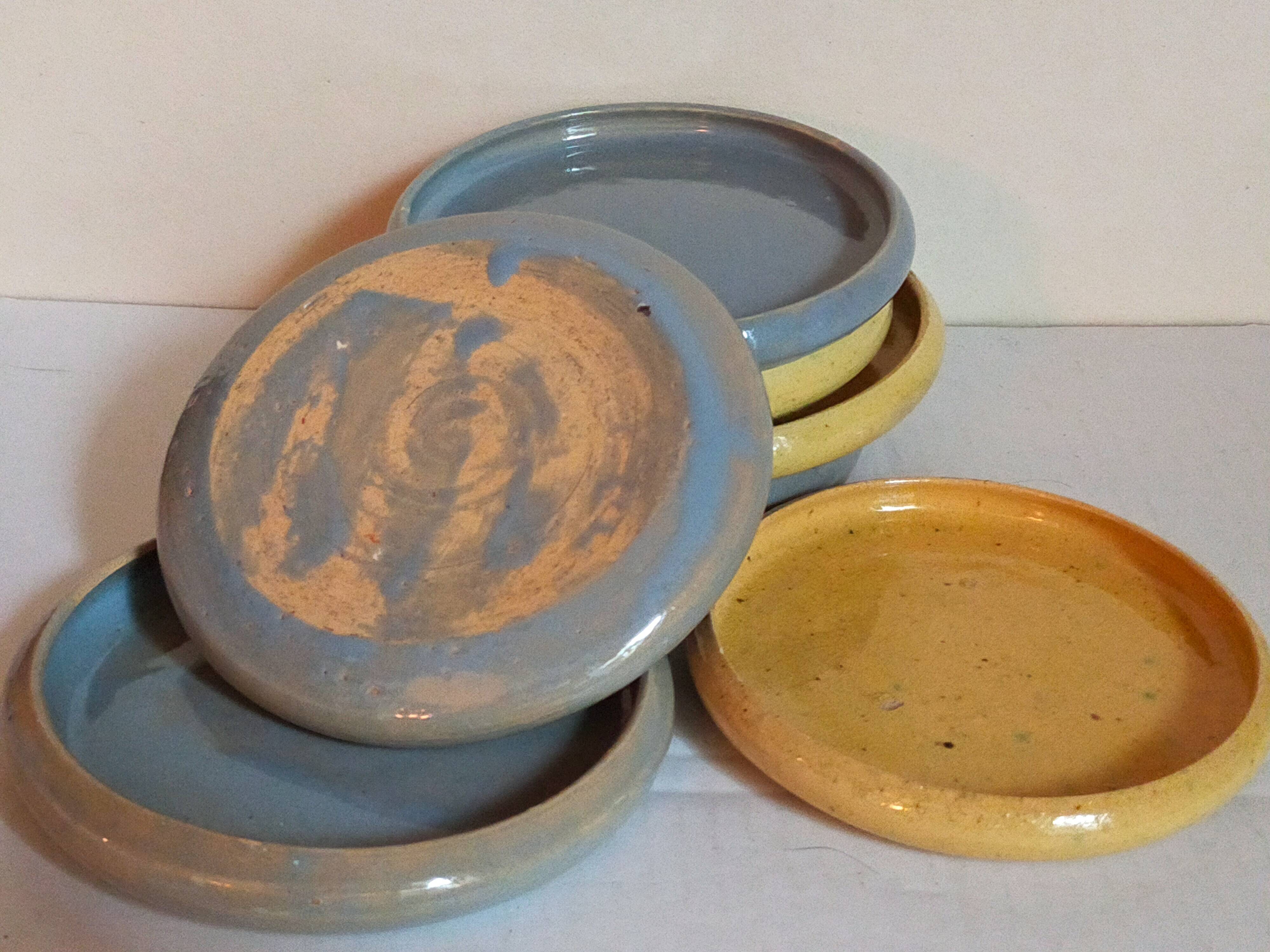 Seven vintage potter's sweet treat plates