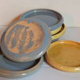 Seven vintage potter's sweet treat plates