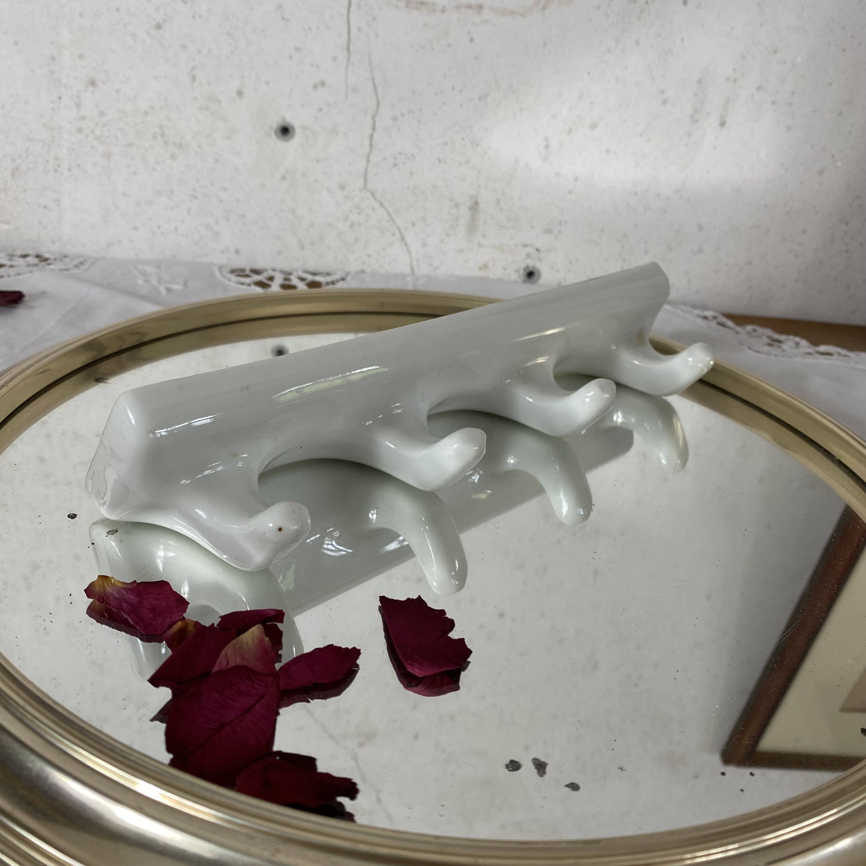 Vintage ceramic tea towel holder
