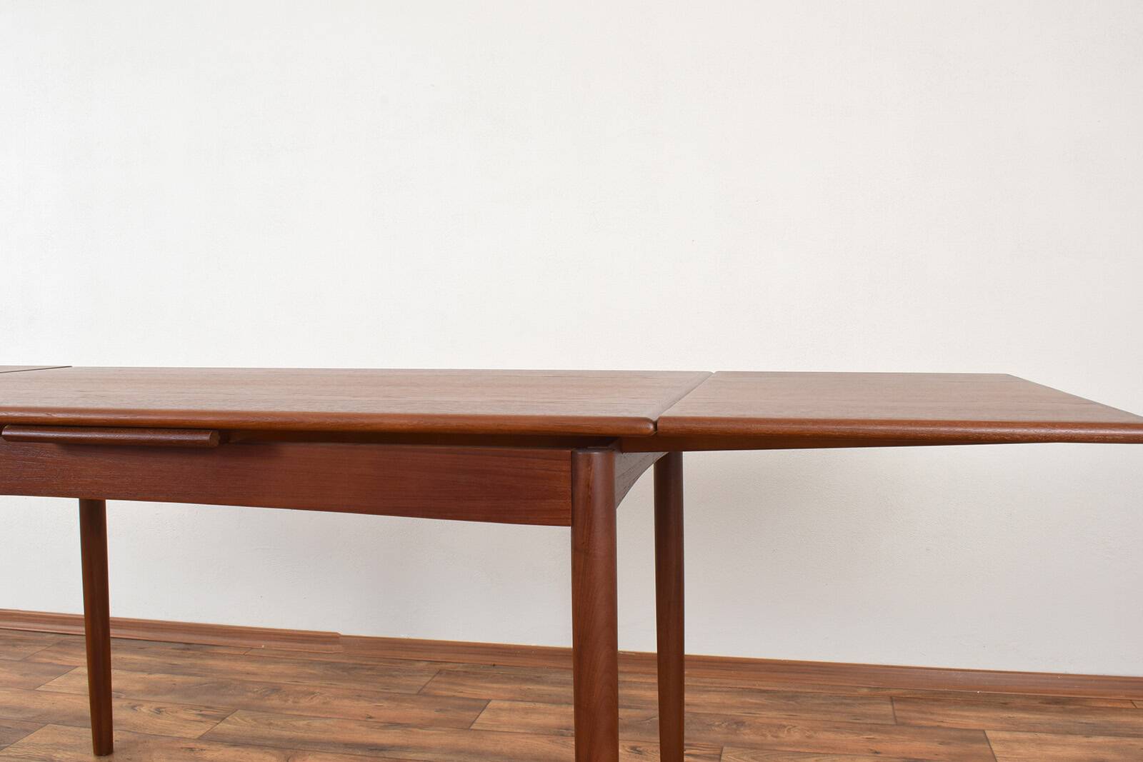 Mid-century Danish teak extendable dining table, 1960s.