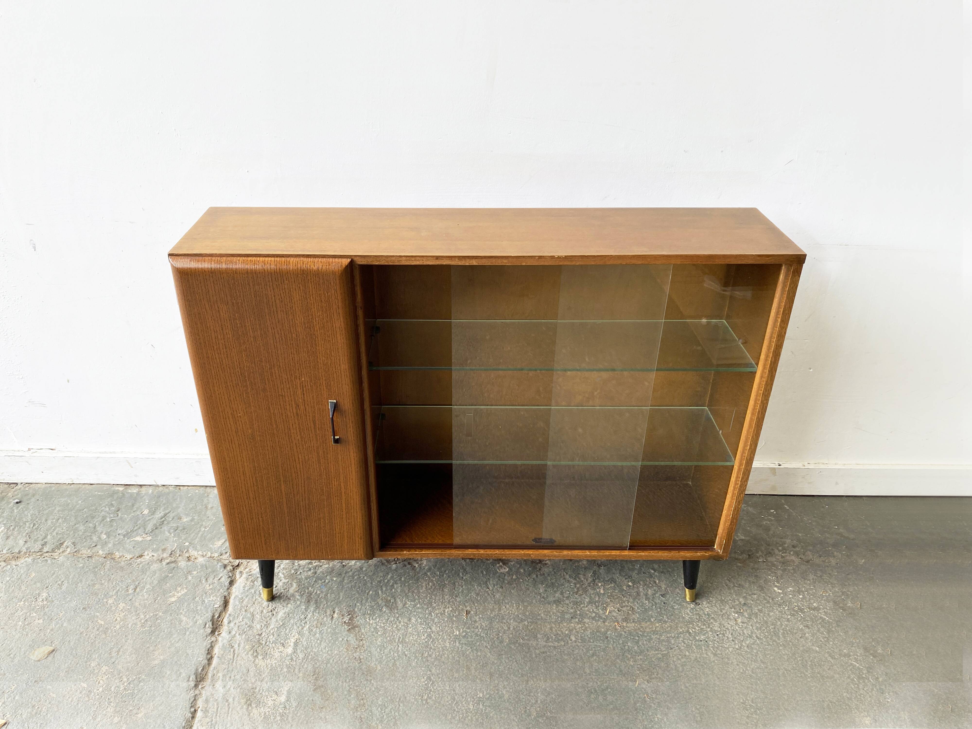 Mid Century vintage  bookcase with sliding glass doors by Turnidg