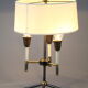 Lampe de table moderniste en métal laqué noir et doré