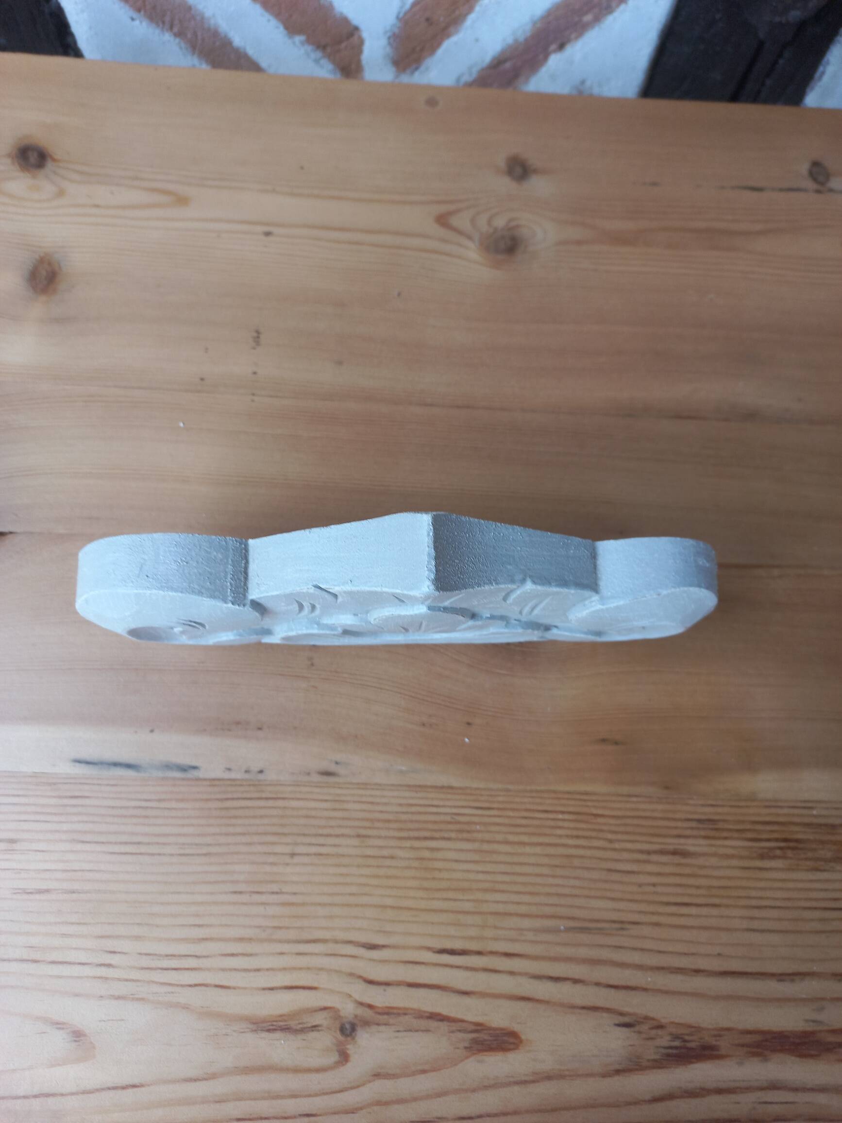 Linen patinated carved pediment woodwork