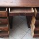Vintage double-sided mahogany desk with 18 drawers.