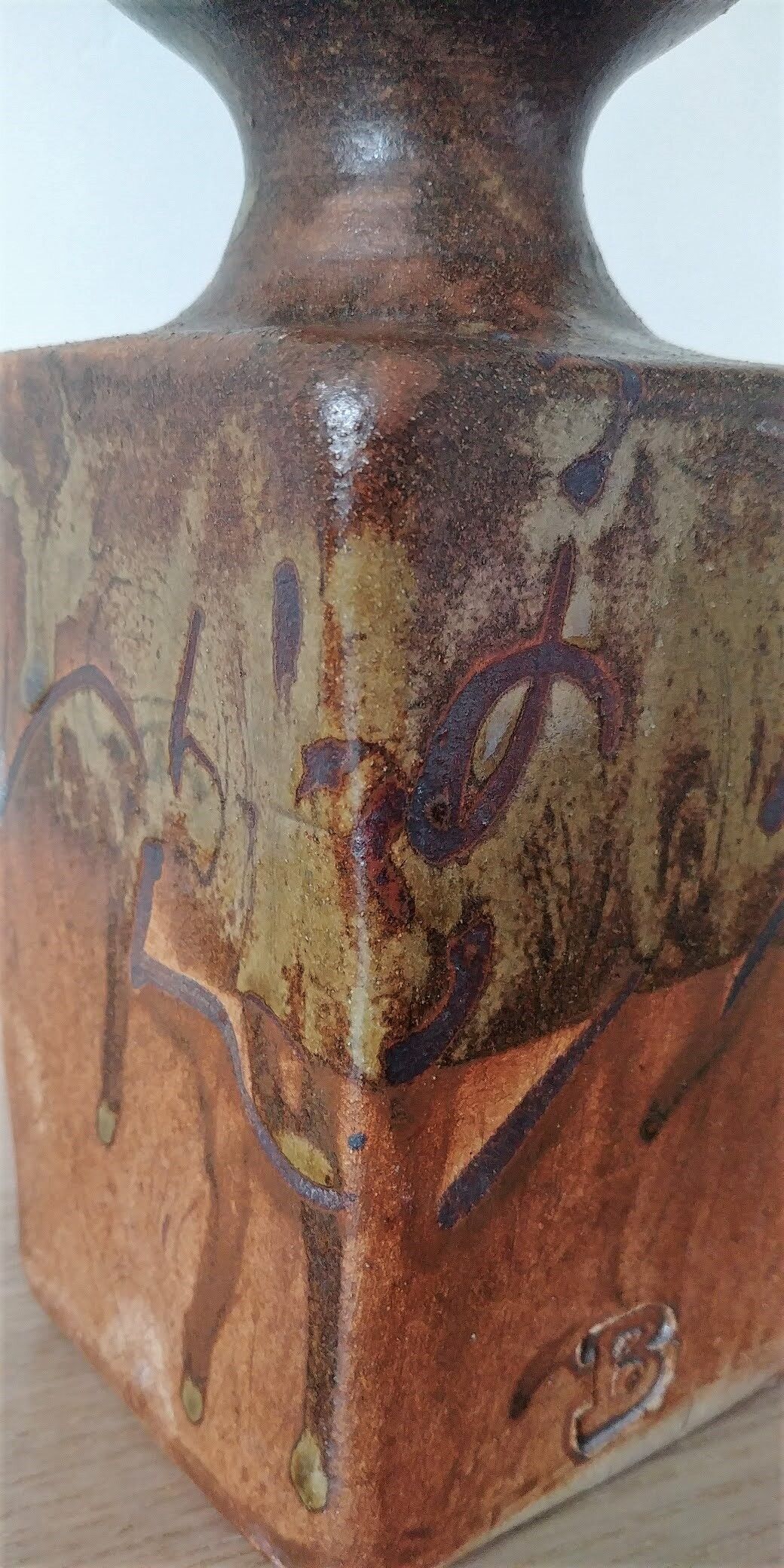 Signed sandstone vase