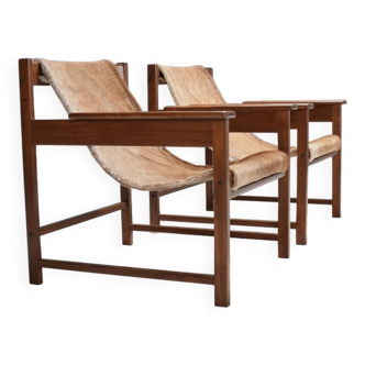 Paire de fauteuils 'Lia' de Sérgio Rodrigues, Brésil, 1962, Jacaranda et peau de vache