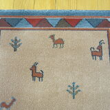 Pair of 60 x 120 Peruvian wool rugs