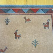 Pair of 60 x 120 Peruvian wool rugs