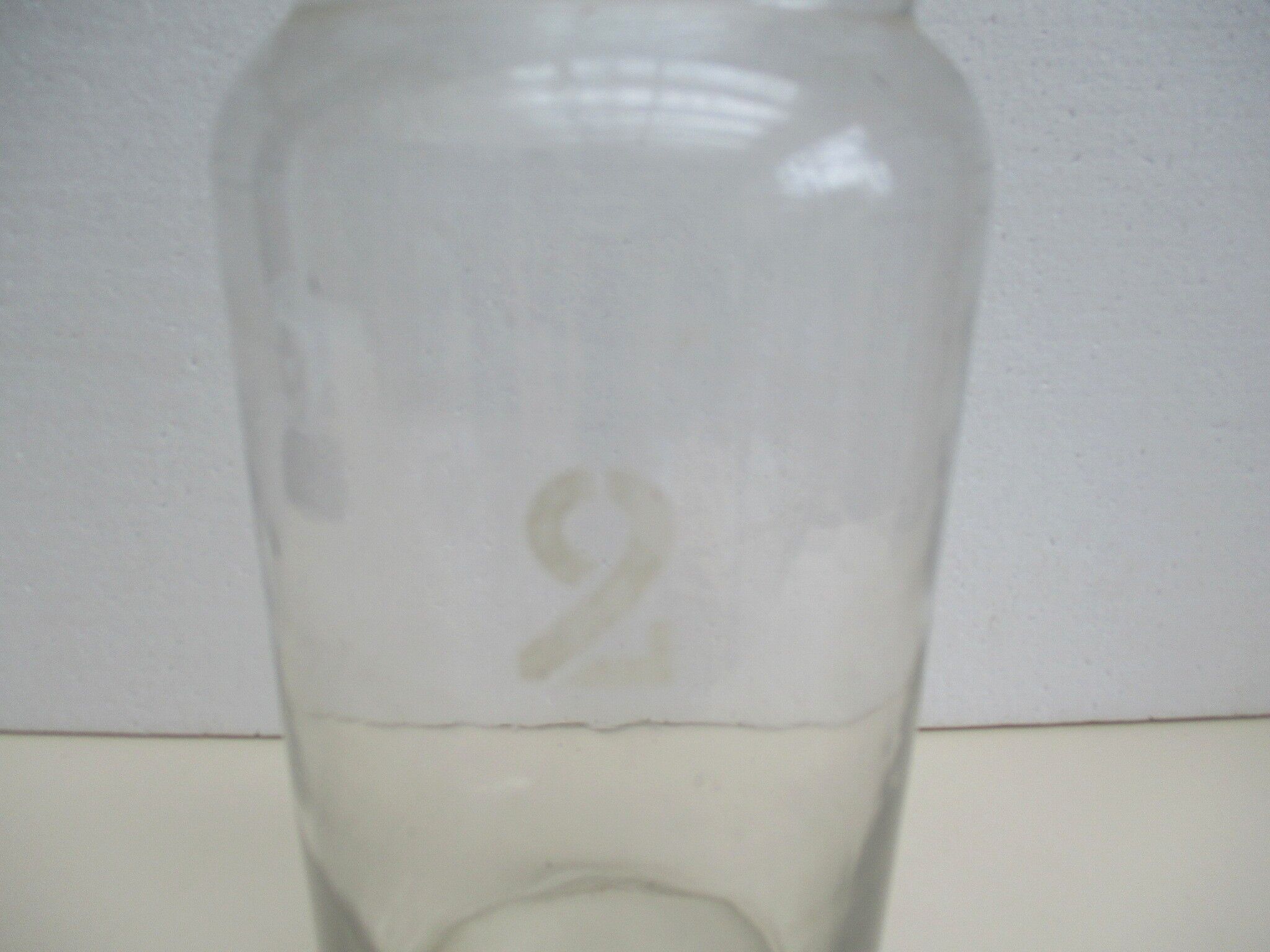 Old blown glass jar, Engraved "2"