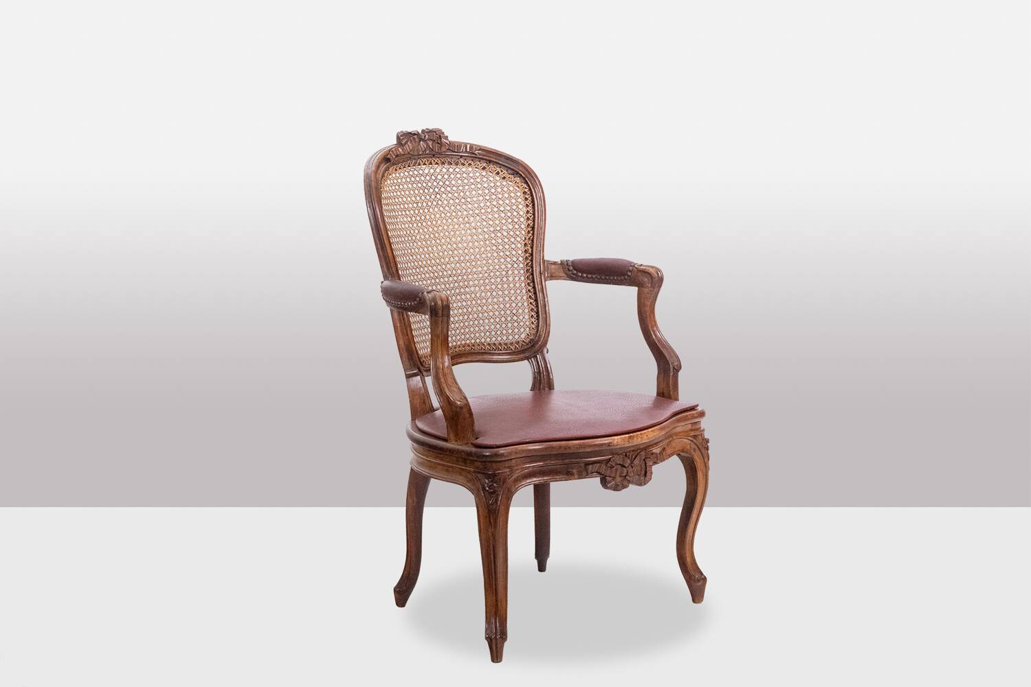 Pair of “cabriolet” armchairs in walnut and canework. Louis XV period. LS5209325