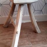 White brutalist tripod stool.