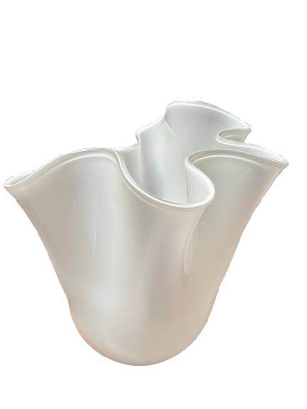 White glass vase in corolla shape