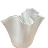 White glass vase in corolla shape