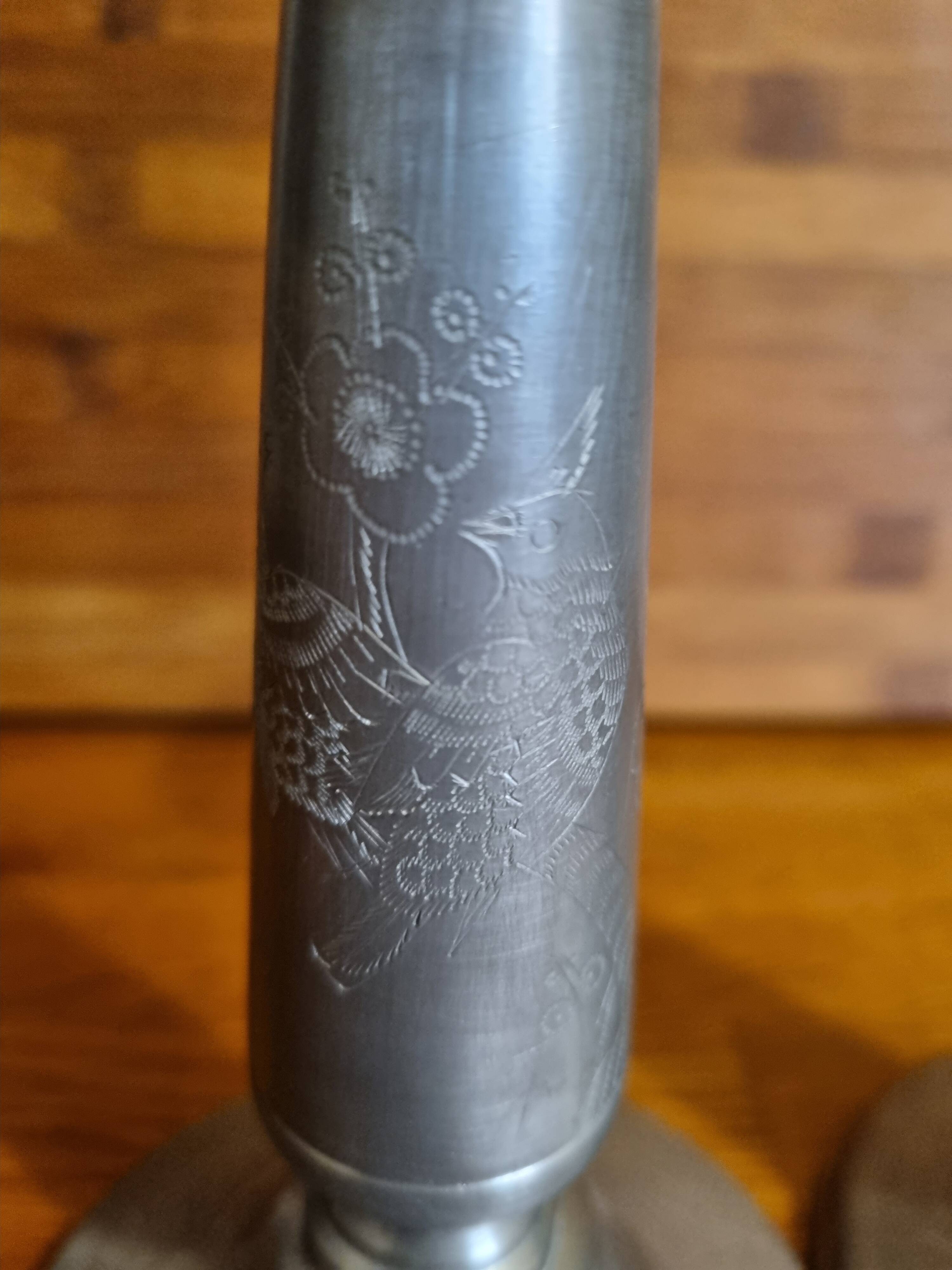Pair of old Chinese candlesticks in engraved pewter