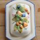 Large vintage faience butter dish with slip decoration – Fruit design