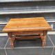 Petit tabouret en bois massif vintage