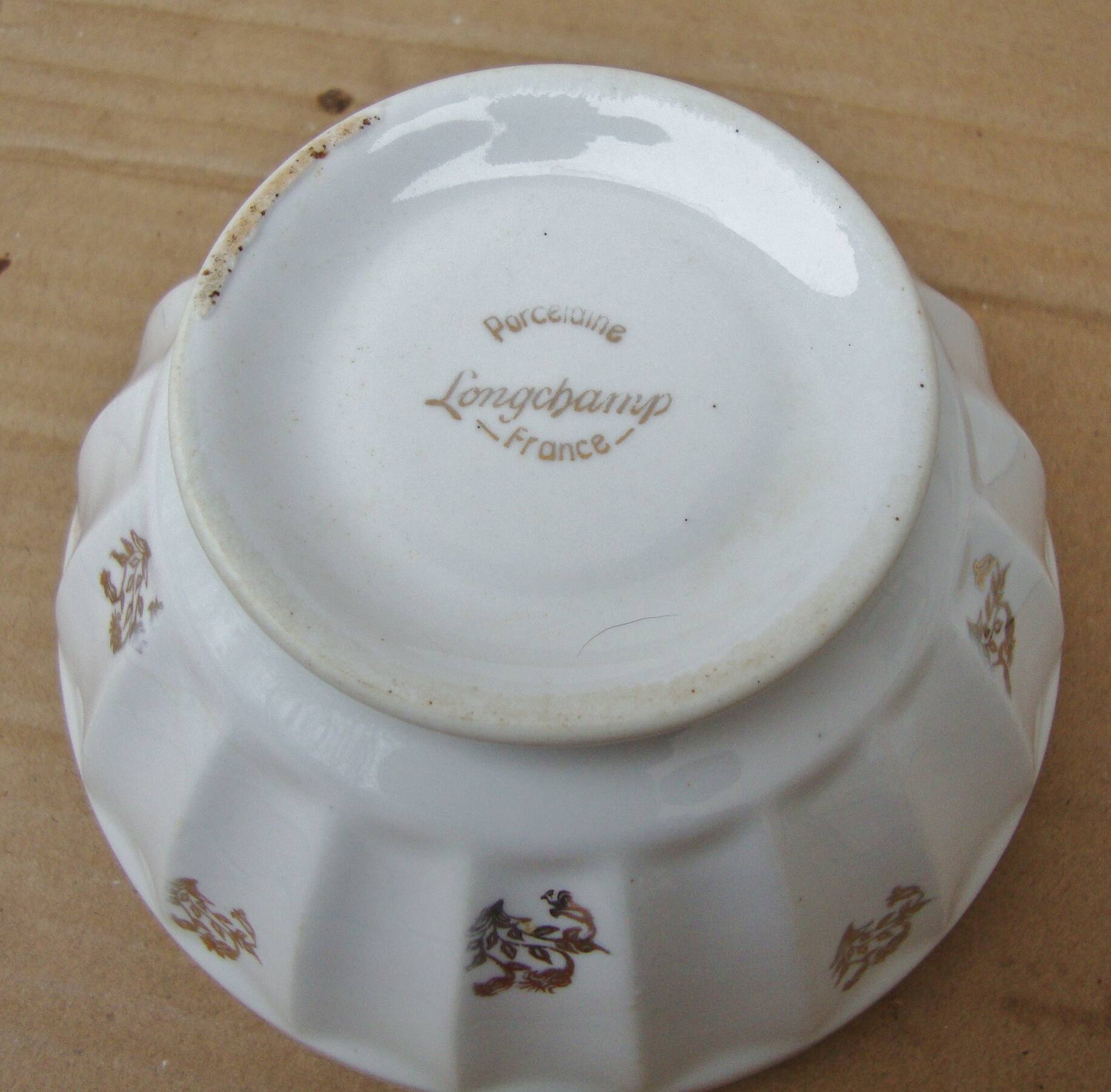 Set of 2 old ribbed white Longchamp porcelain bowls with gold decoration