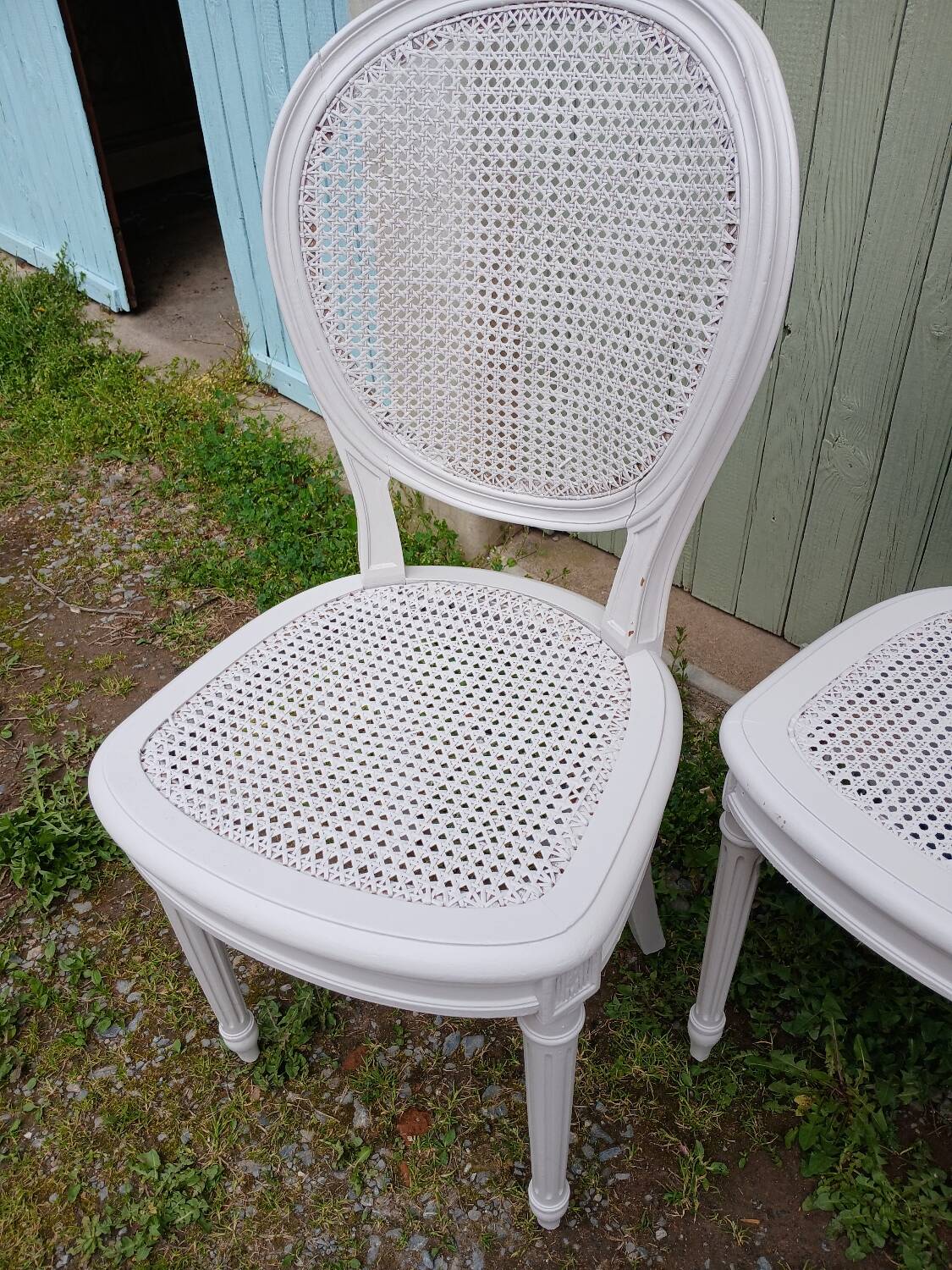 4 old wooden and cane chairs