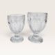 Set of 5 stemmed glasses made of pressed moulded glass.
