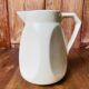 A pair of vintage ceramic jugs from the 1950s.