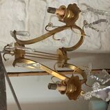 Art deco wall lamp with beveled stamps in gilded brass