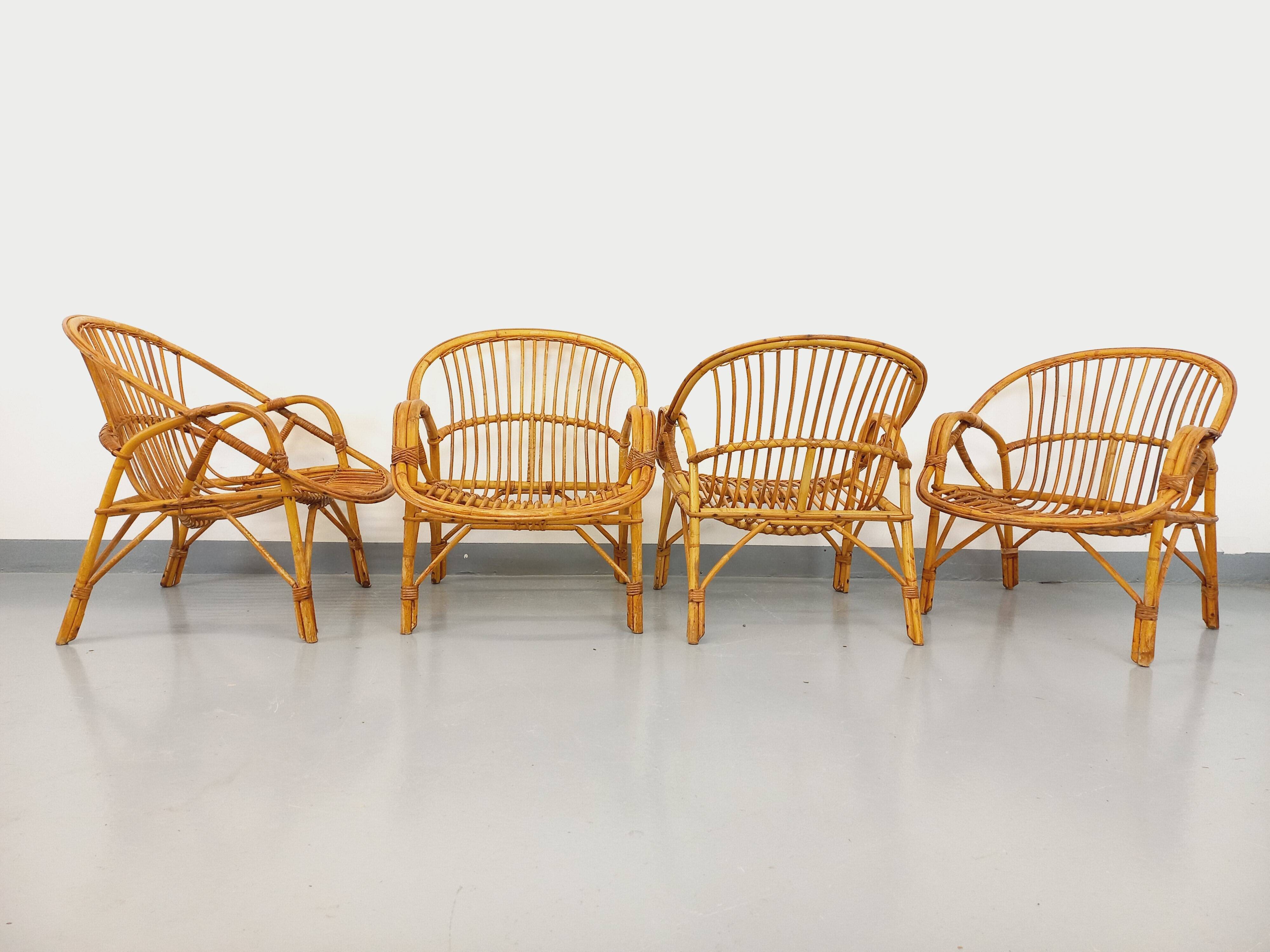Set of 4 vintage rattan armchairs from the 60s