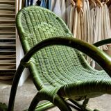 Children's rocking chair in woven wicker and green rattan