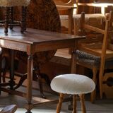 Modern Danish, a pair of tripod stools, seats reupholstered in lambswool, 1950s.