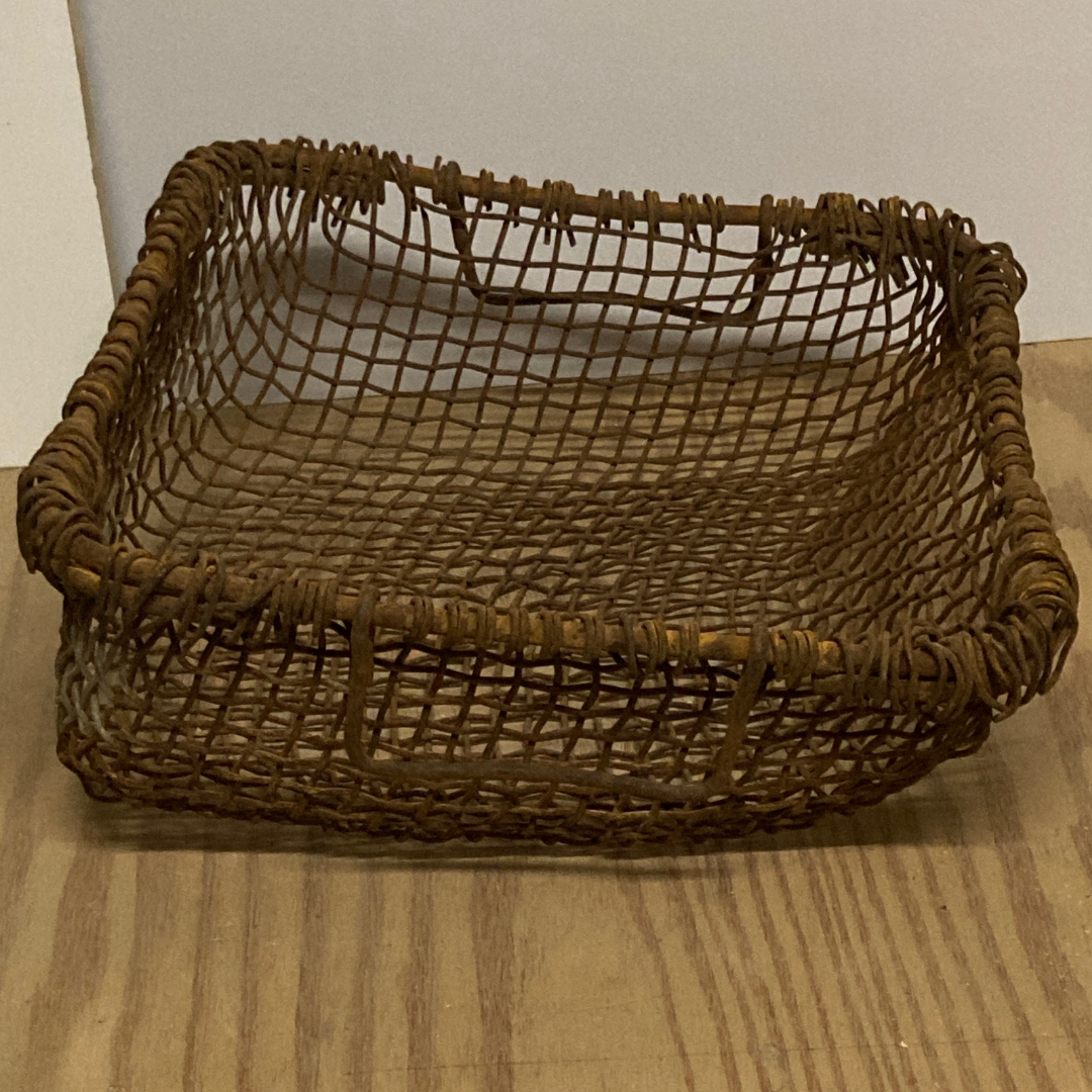 Antique woven rustic metal fireplace basket, Netherlands ca 1900