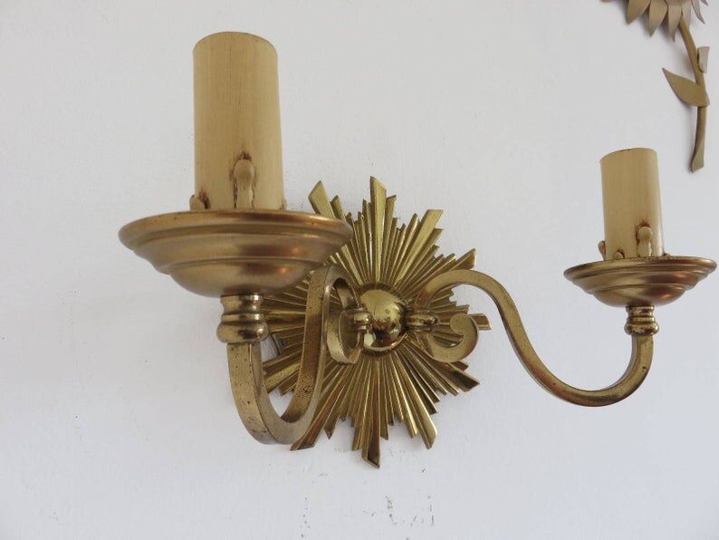 Wall lamp "little sun" in 70s golden brass