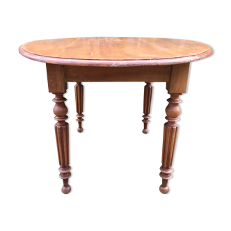 Old oval cherry table umbrella legs